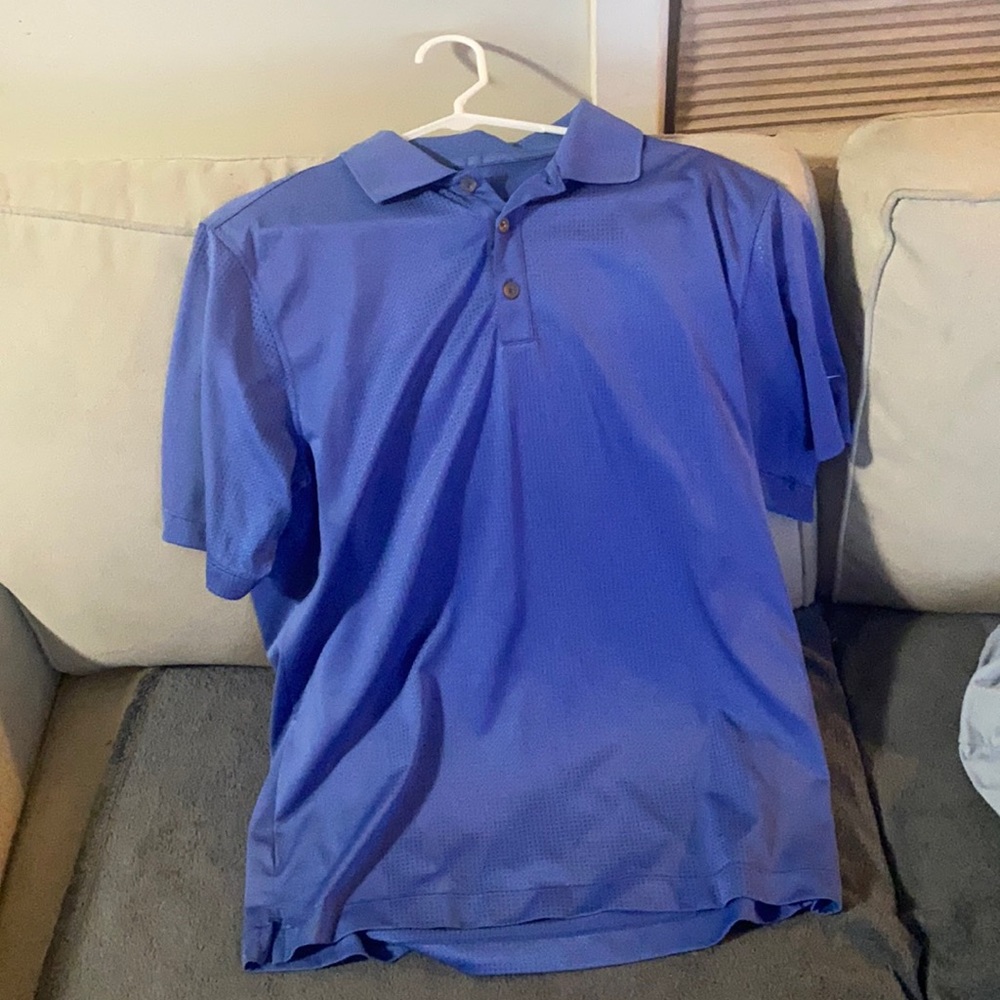 Blue Nike golf polo